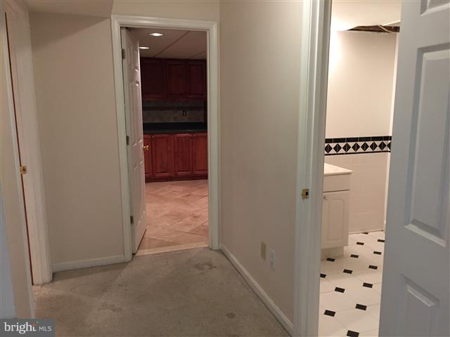 166 Dundee Road Severna Park, MD 21146 - Photo 21 of 25 a view of hallway with bathroom