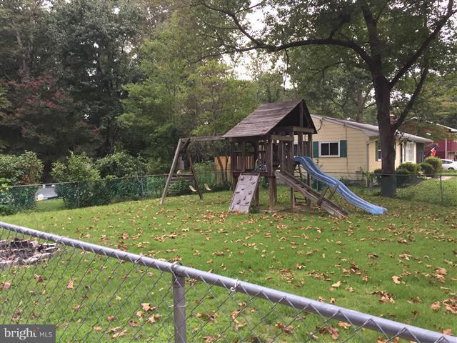 166 Dundee Road Severna Park, MD 21146 - Photo 24 of 25 a house with a tree in front of it