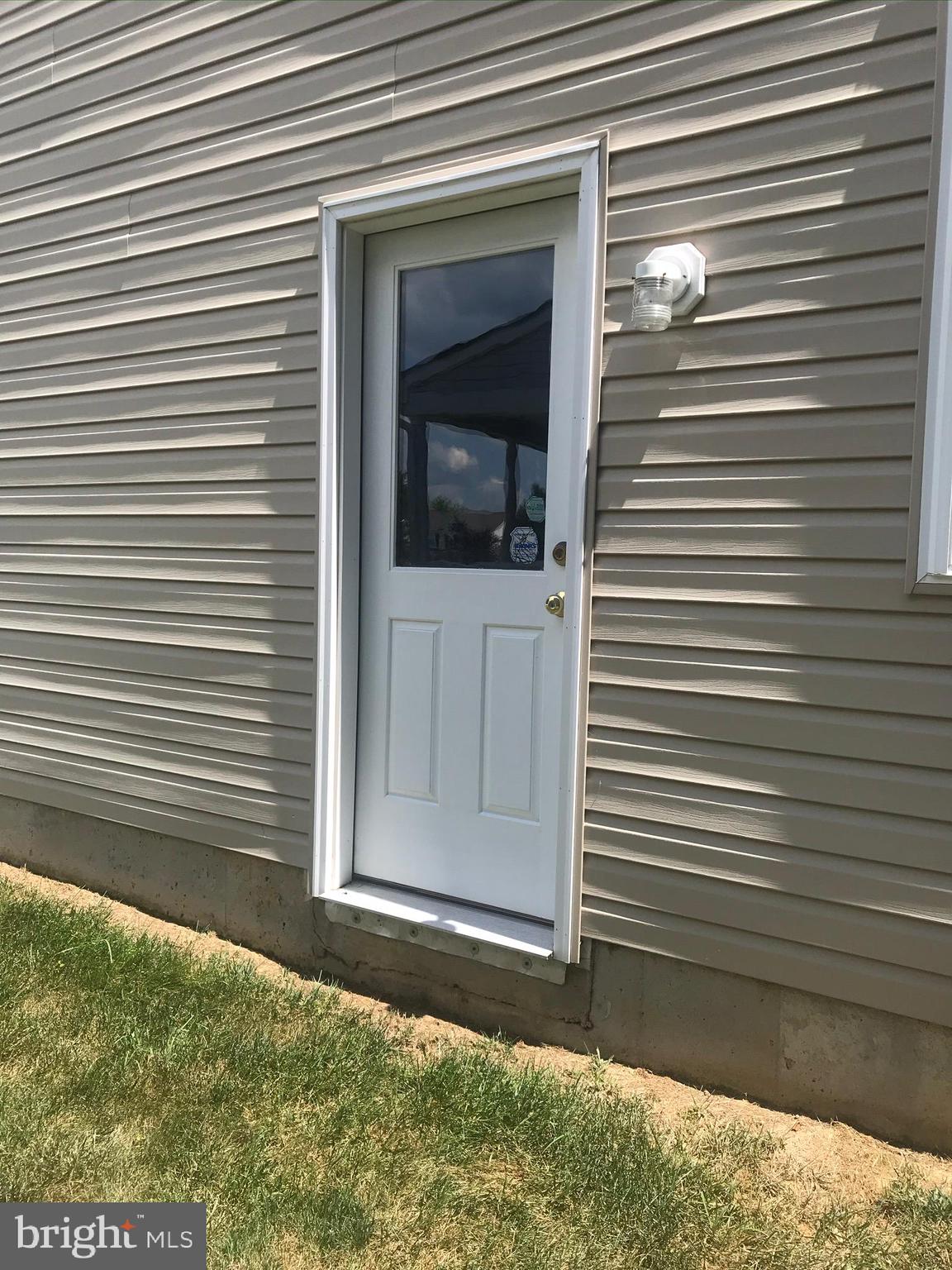 25 Bancroft Road New Castle, DE 19720 - Photo 33 of 33 Side entry door to Garage