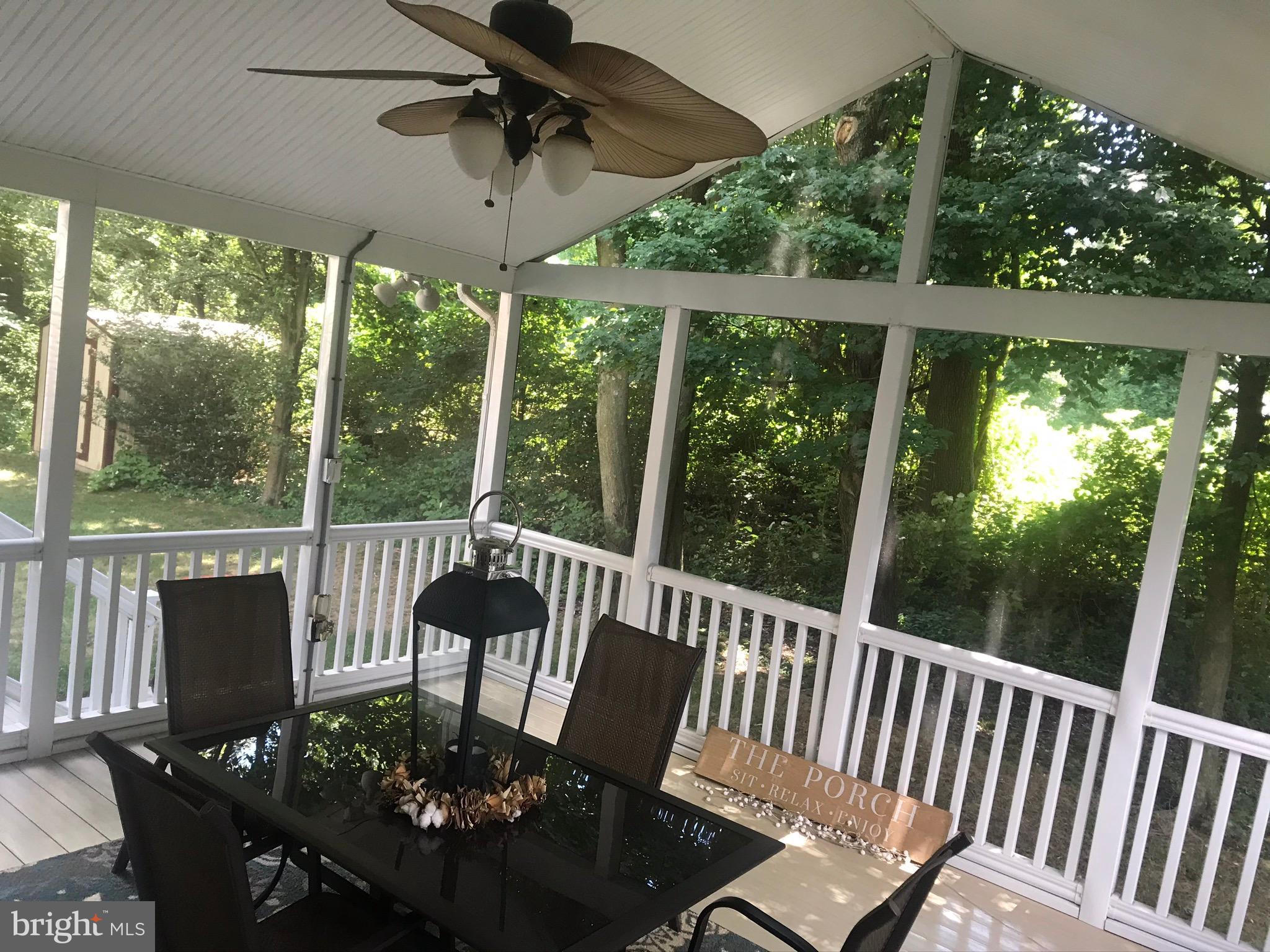 25 Bancroft Road New Castle, DE 19720 - Photo 10 of 33 Screened in Porch with Ceiling Fan