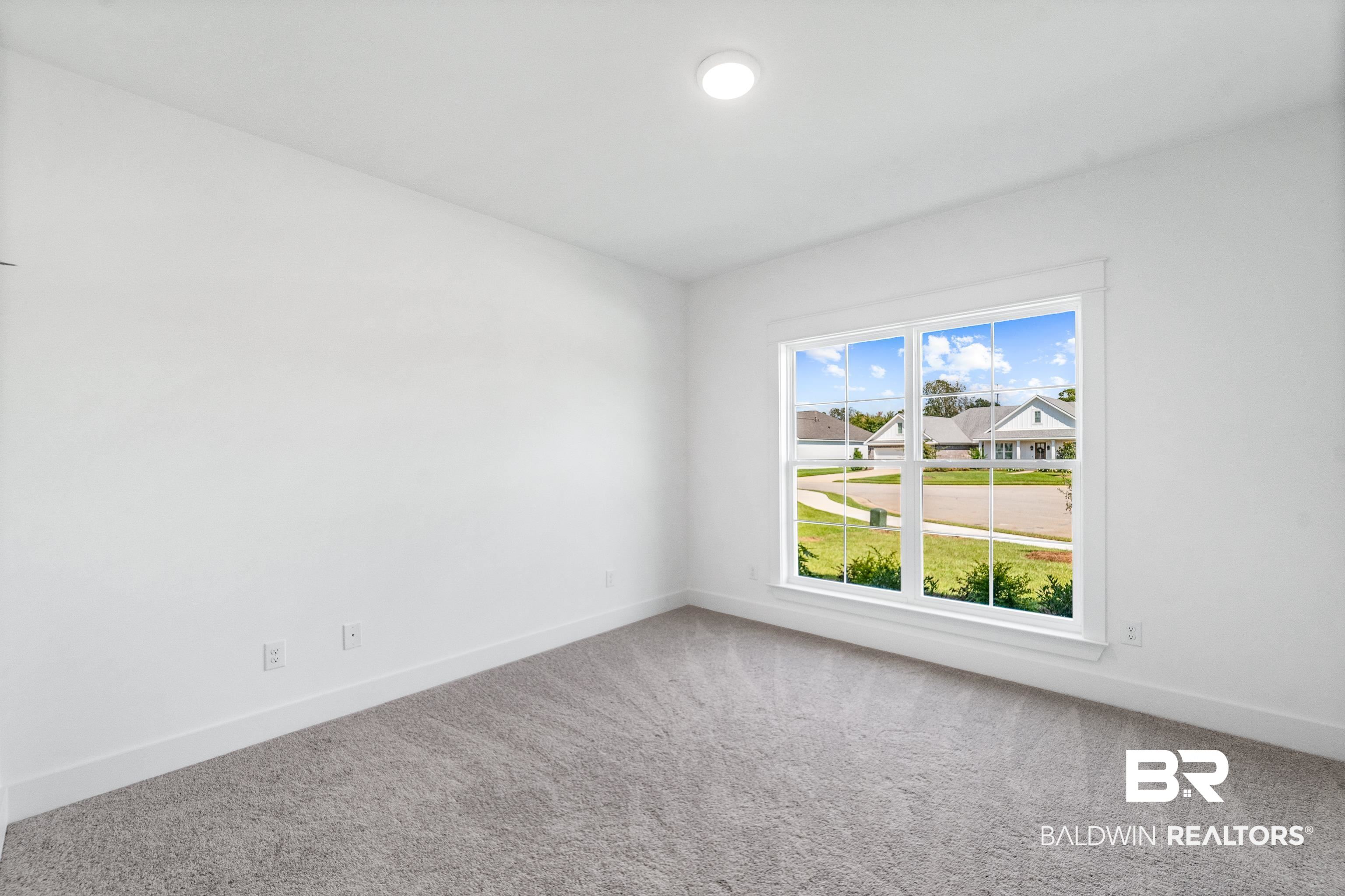 25927 Capra Court Daphne, AL 36526 - Photo 25 of 37 Empty room with carpet flooring