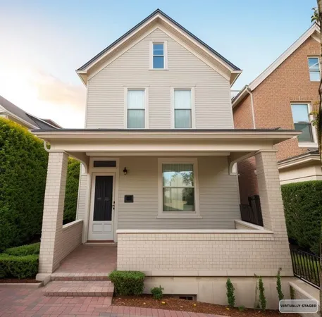 a front view of a house with garage