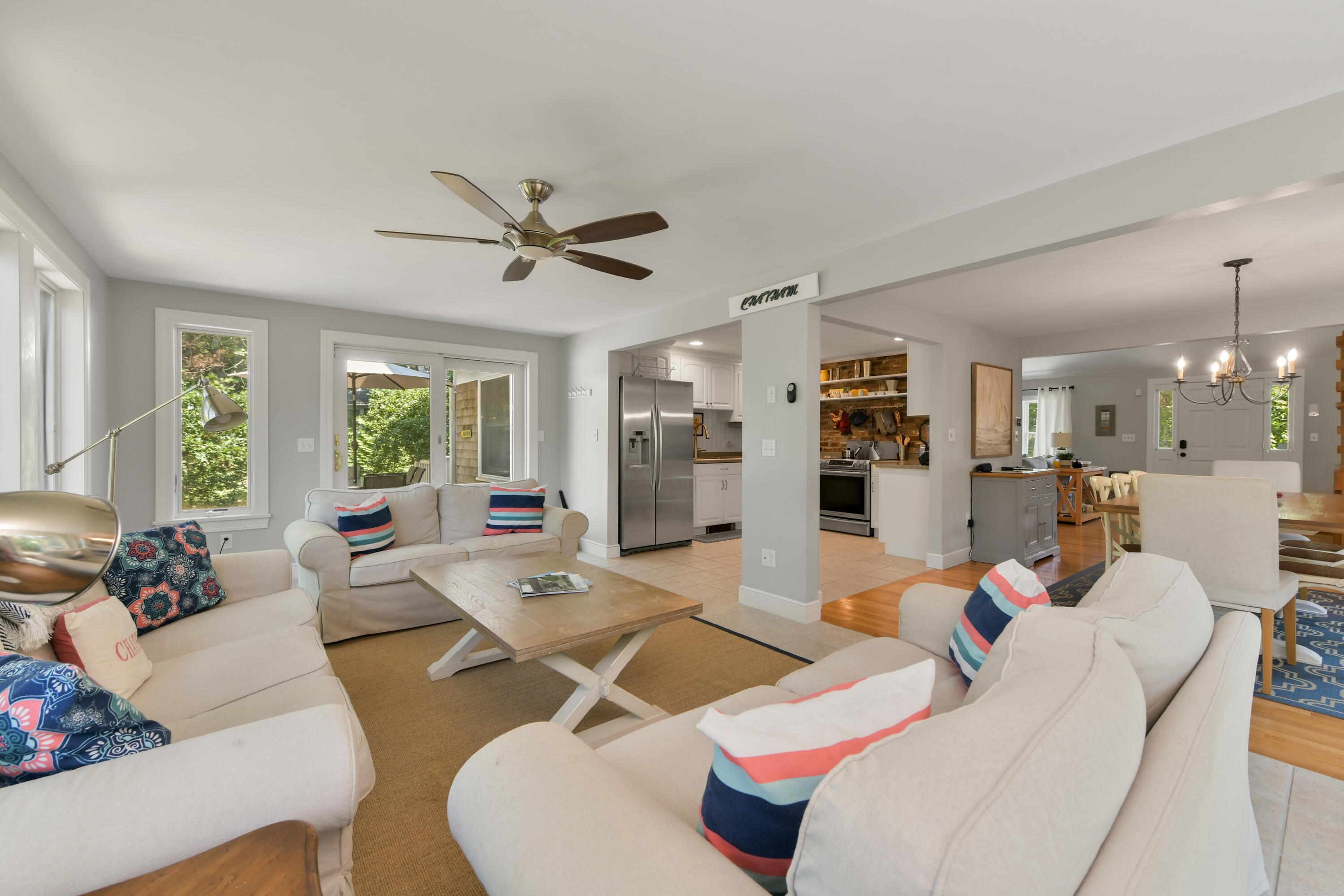 121 Middle Road North Chatham, MA 02650 - Photo 8 of 38 a living room with furniture and a large window