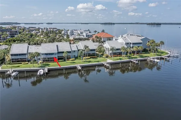 a view of swimming pool with outdoor seating space and outdoor seating