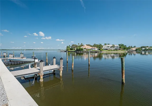 a view of living room with fireplace and lots of trees