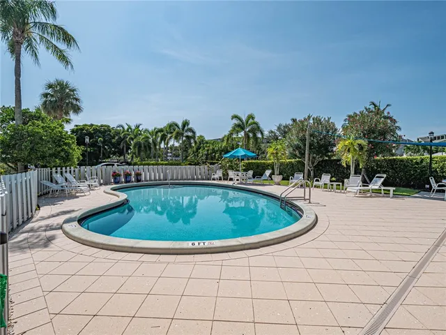 a view of outdoor space swimming pool and lake view