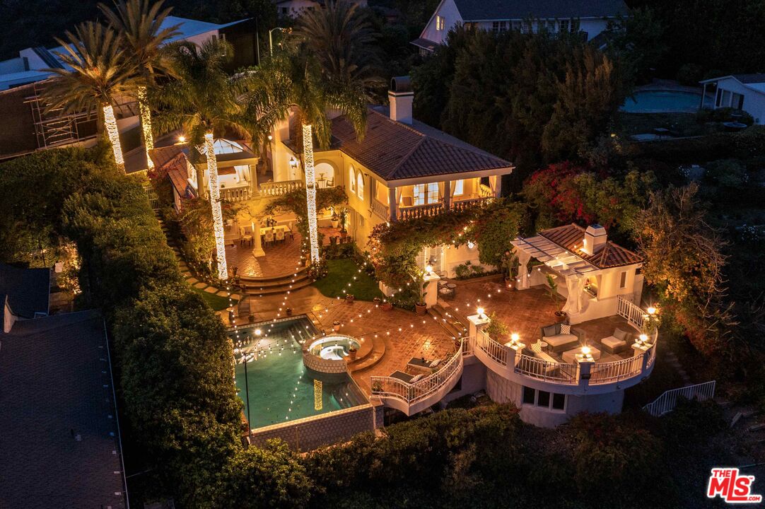1100 Stradella Road Los Angeles, CA 90077 - Photo 26 of 26 an aerial view of a house with garden space and street view