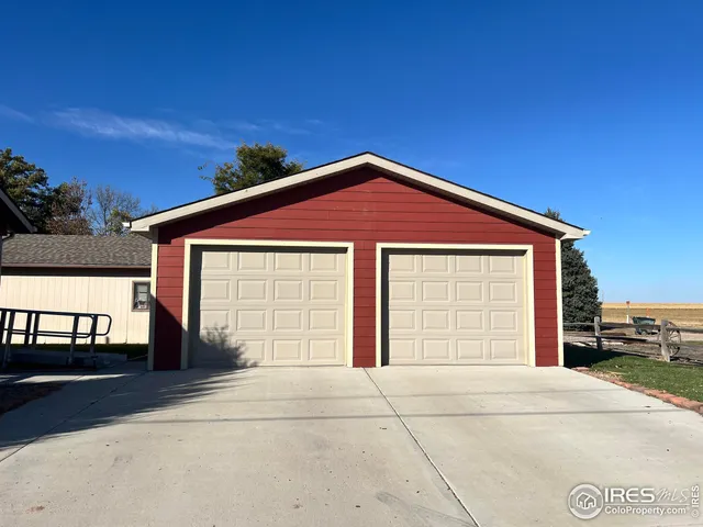a front view of a house with a garage