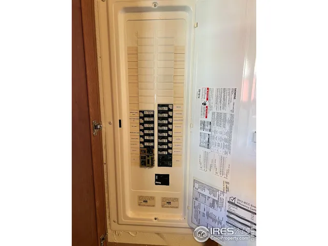 a view of a bathroom with a shower curtain