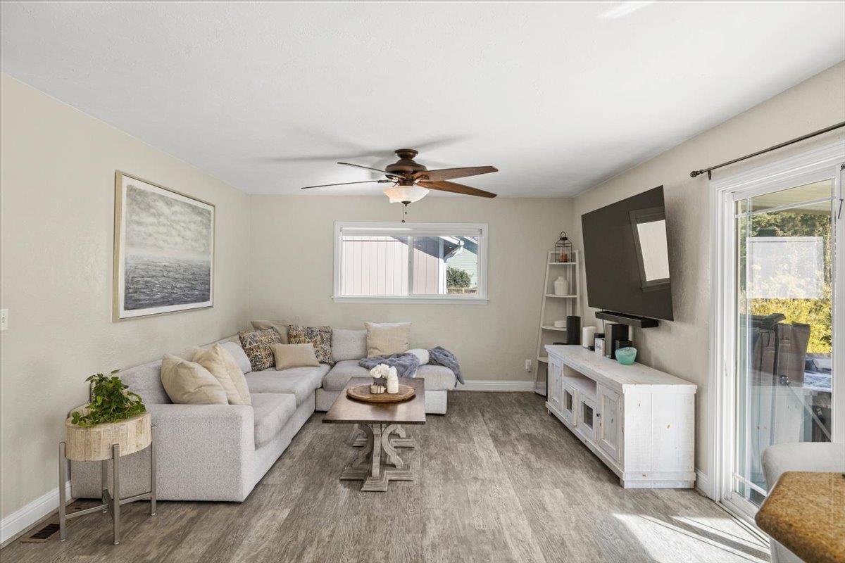 11195 Ringtail Road Penn Valley, CA 95946 - Photo 11 of 47 a living room with furniture and a flat screen tv