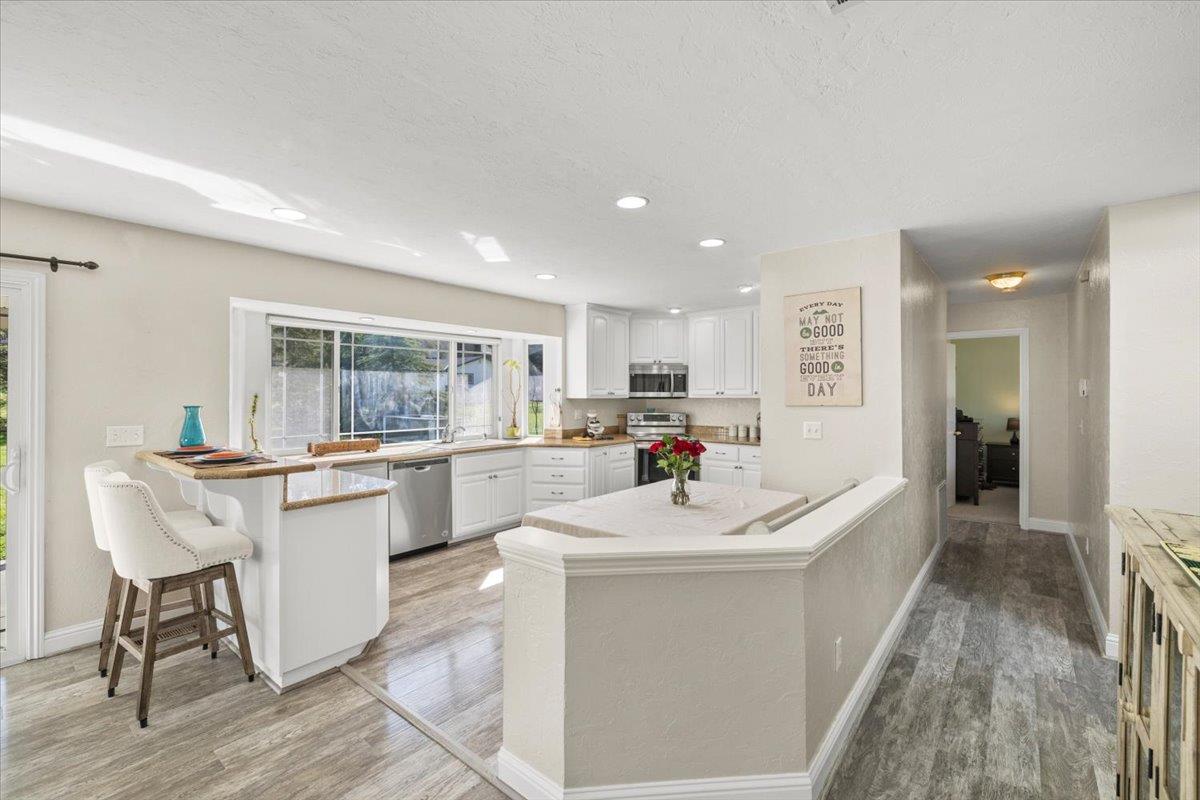 11195 Ringtail Road Penn Valley, CA 95946 - Photo 13 of 47 a kitchen with a sink cabinets and counter space
