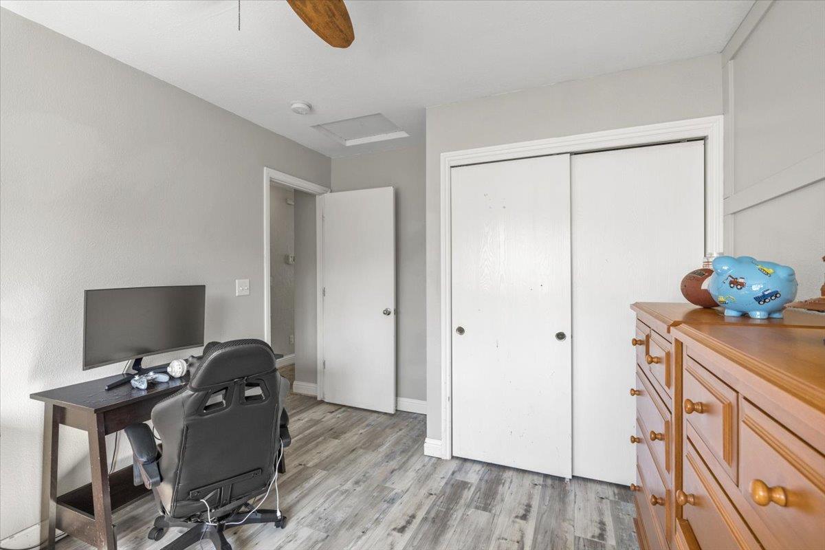 11195 Ringtail Road Penn Valley, CA 95946 - Photo 23 of 47 a view of a workspace with furniture and wooden floor