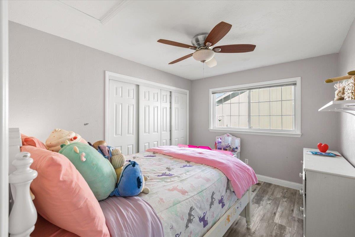 11195 Ringtail Road Penn Valley, CA 95946 - Photo 25 of 47 a bed sitting in a bedroom next to a window