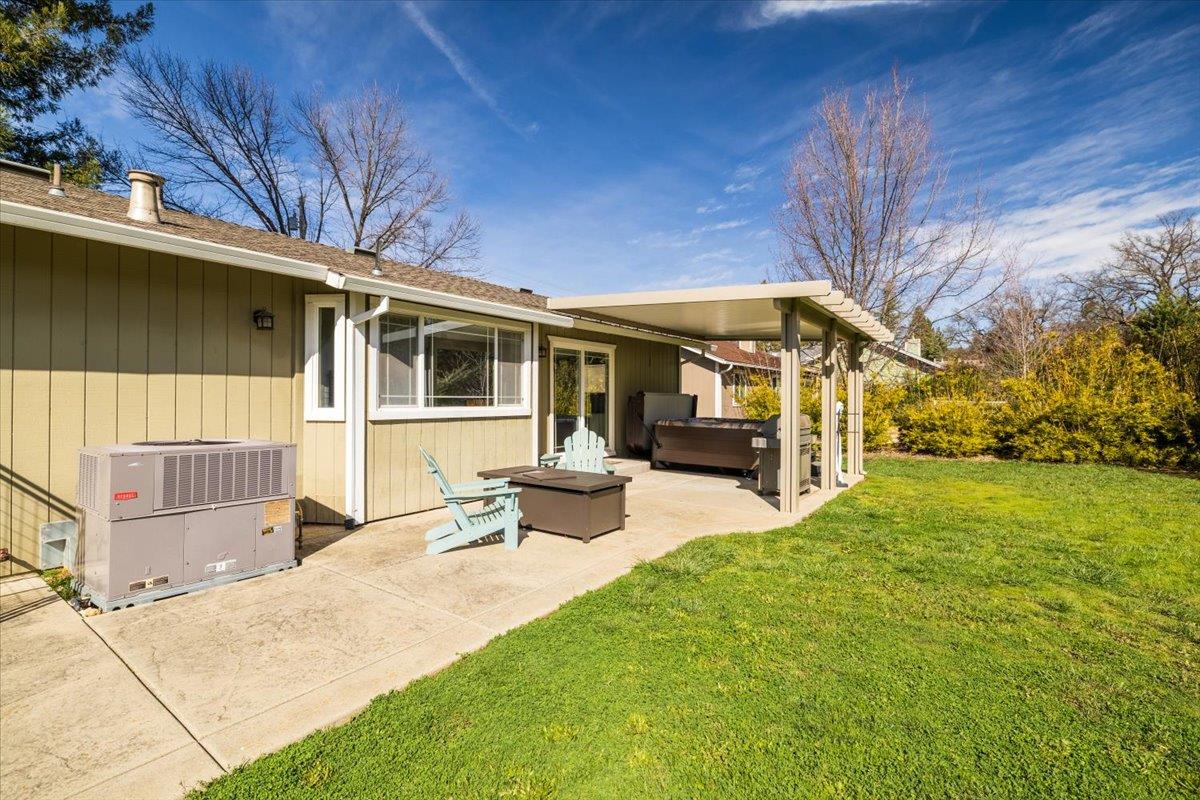 11195 Ringtail Road Penn Valley, CA 95946 - Photo 34 of 47 a view of a house with a patio