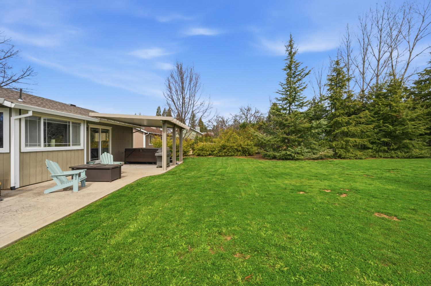 11195 Ringtail Road Penn Valley, CA 95946 - Photo 39 of 47 a front view of house with yard and seating area
