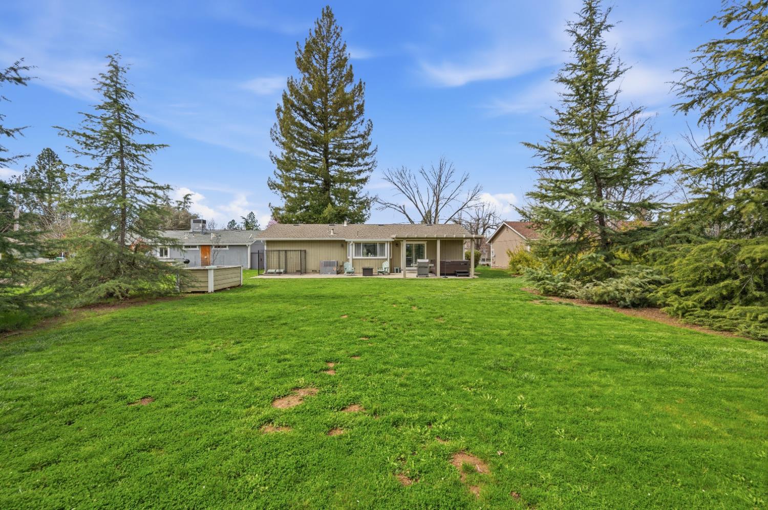 11195 Ringtail Road Penn Valley, CA 95946 - Photo 40 of 47 a front view of a house with a garden