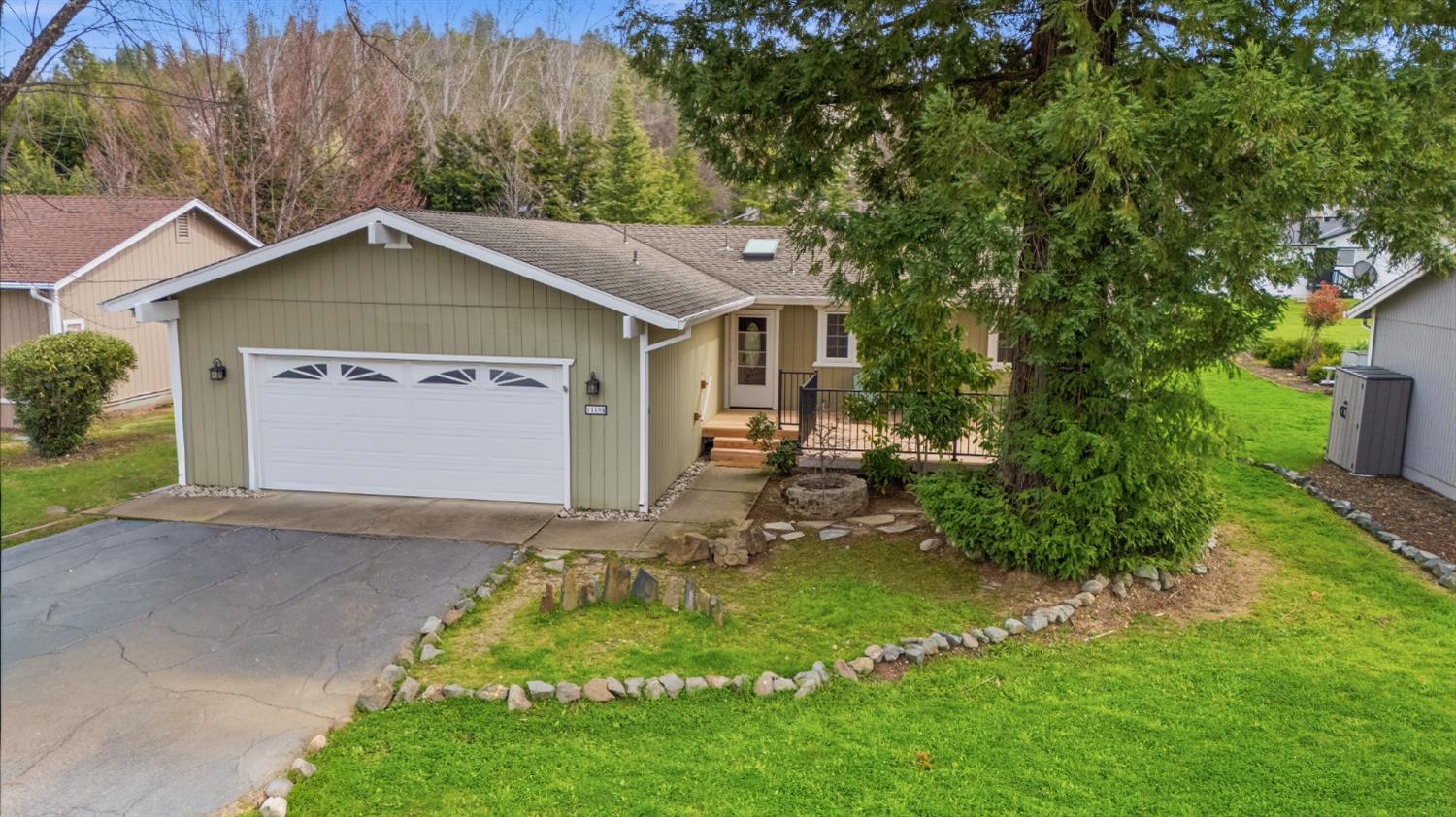 11195 Ringtail Road Penn Valley, CA 95946 - Photo 46 of 47 a front view of a house with garden