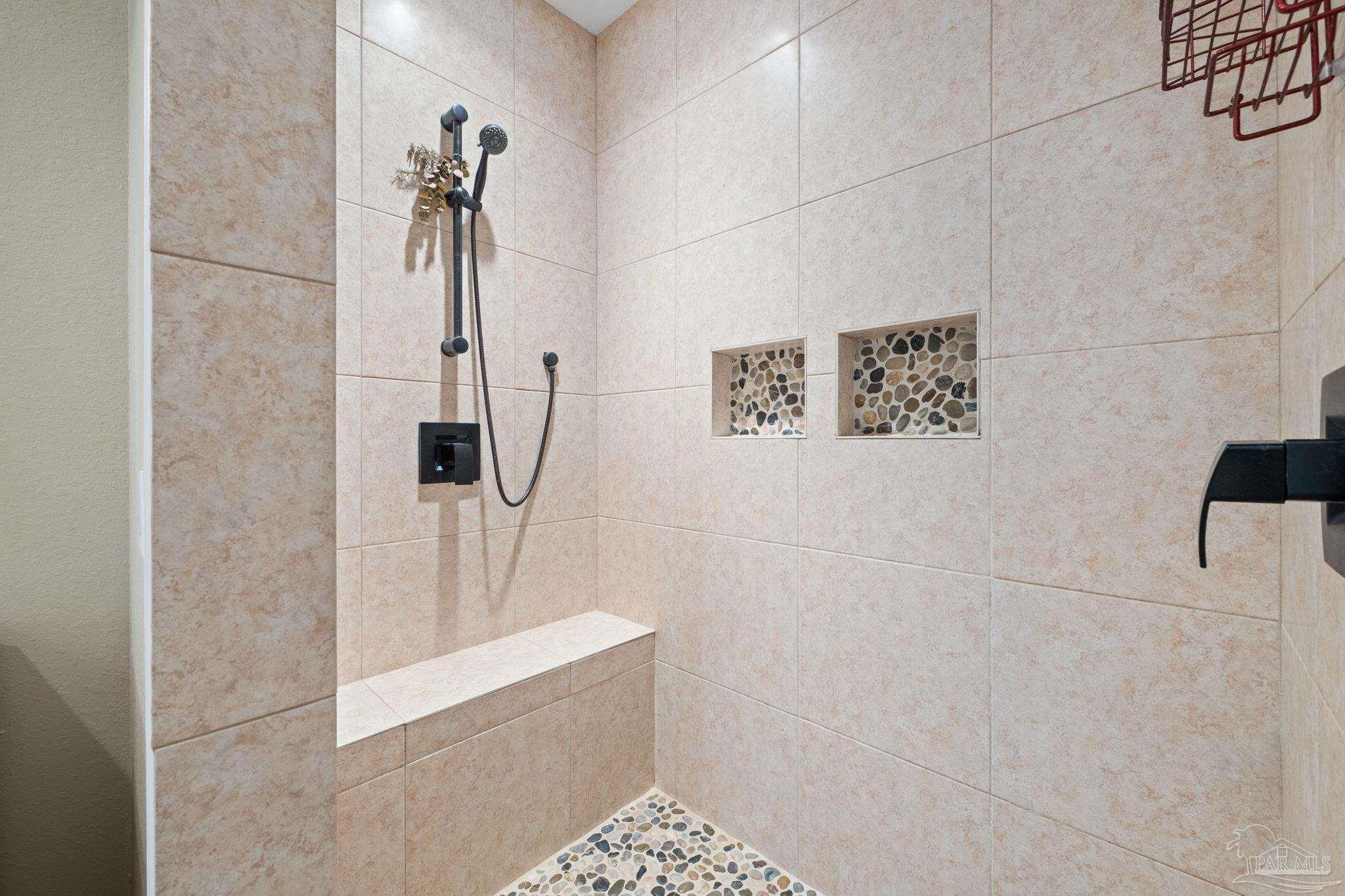 6781 Generals Lane Pace, FL 32571 - Photo 17 of 35 a bathroom with a shower