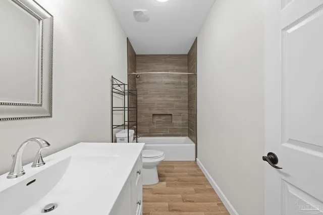 a bathroom with a sink and a shower