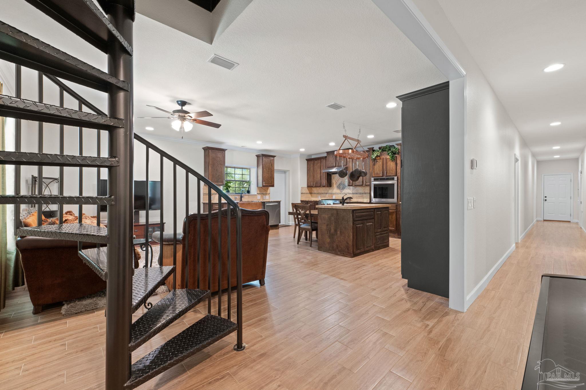 6781 Generals Lane Pace, FL 32571 - Photo 2 of 35 a view of a kitchen and a dining room