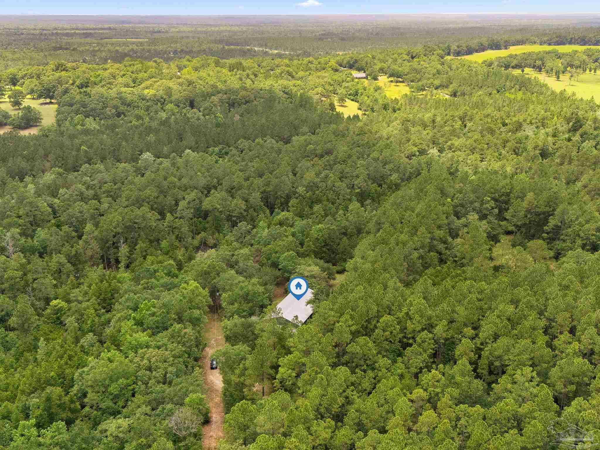 6781 Generals Lane Pace, FL 32571 - Photo 33 of 35 a view of an outdoor space and a yard