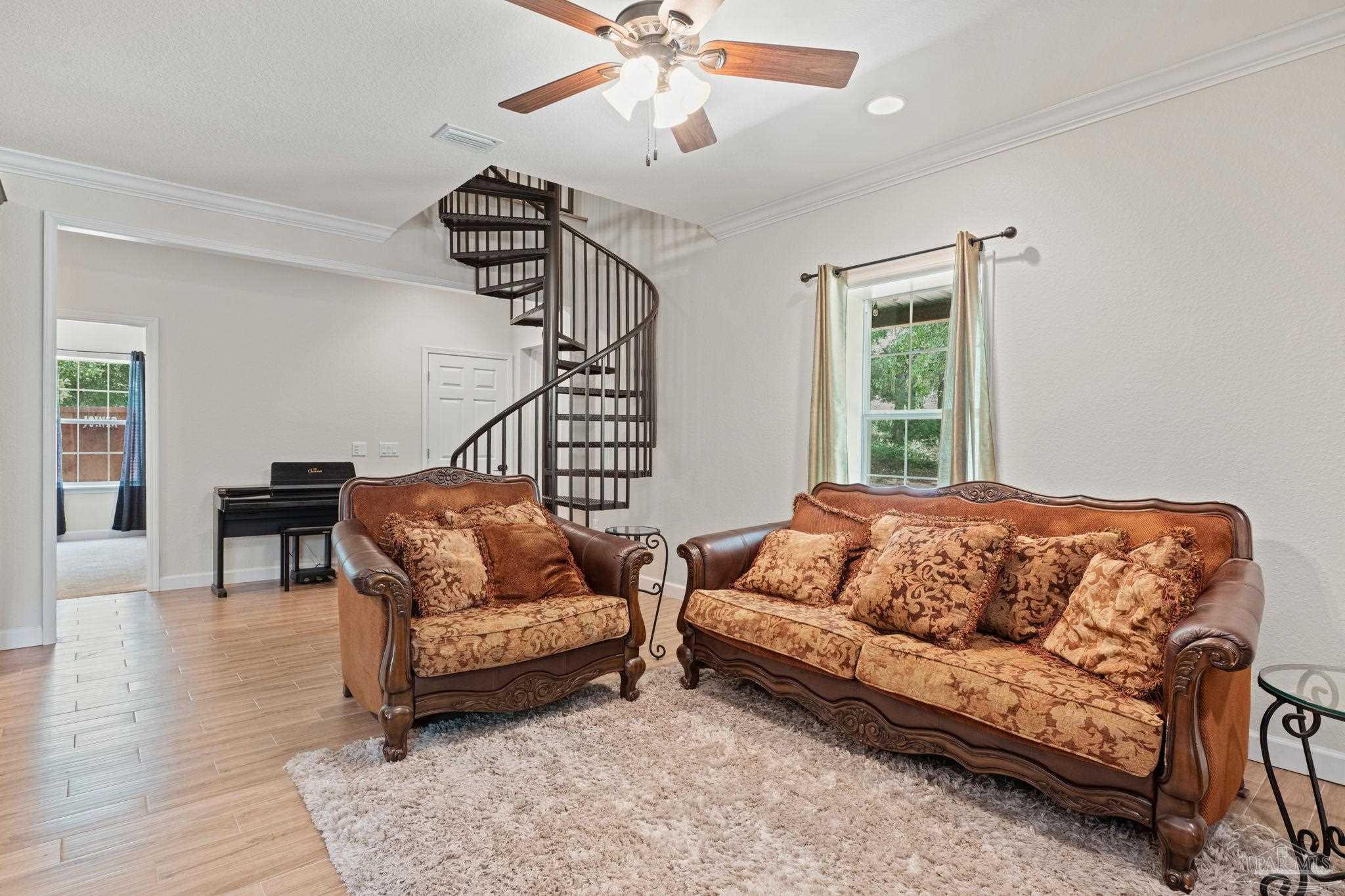 6781 Generals Lane Pace, FL 32571 - Photo 6 of 35 a living room with furniture and a window