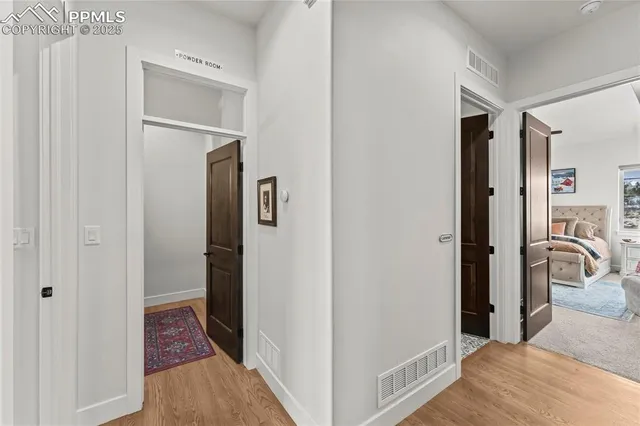 a view of a bedroom from a hallway