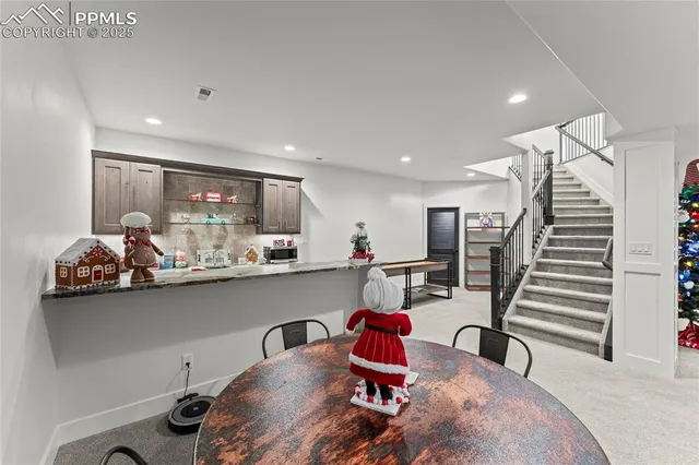 a room with furniture and a flat screen tv