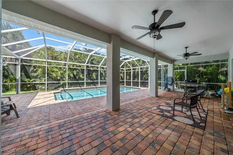 a view of a house with a backyard and a window