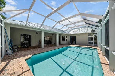 a view of a house with a yard patio and deck
