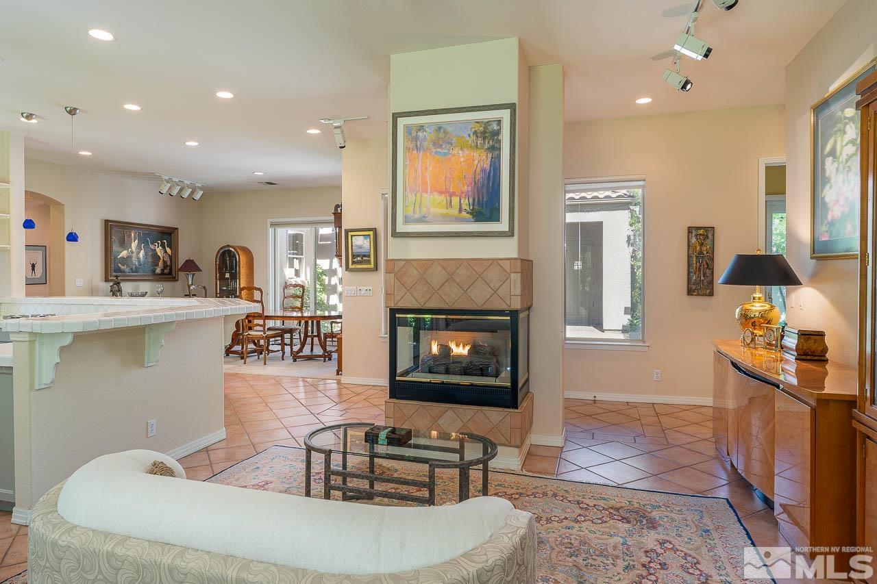 4440 Juniper Trail Reno, NV 89519 - Photo 13 of 29 a living room with furniture and a fireplace