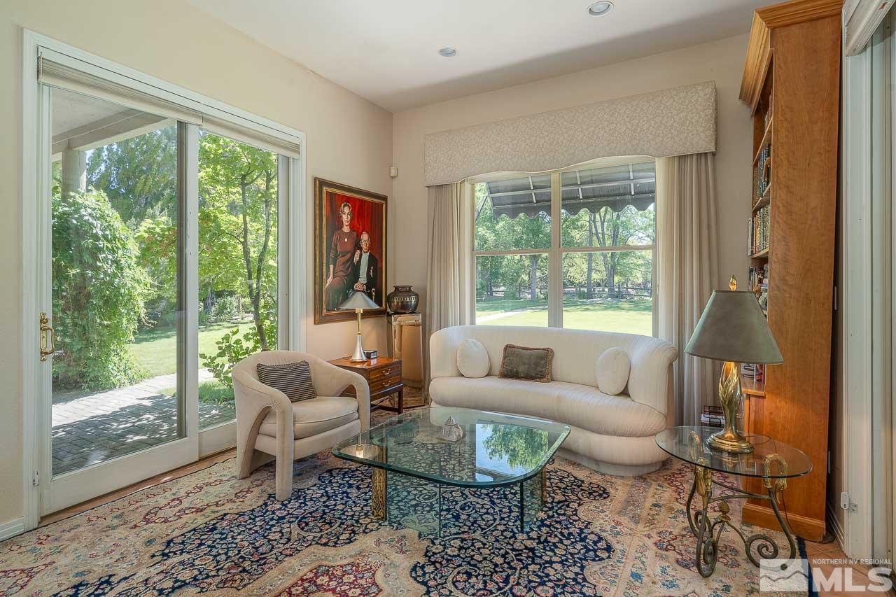 4440 Juniper Trail Reno, NV 89519 - Photo 14 of 29 a living room with furniture and a large window