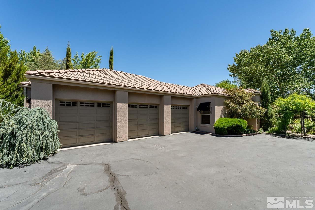 4440 Juniper Trail Reno, NV 89519 - Photo 29 of 29 a view of a house with a yard and potted plants