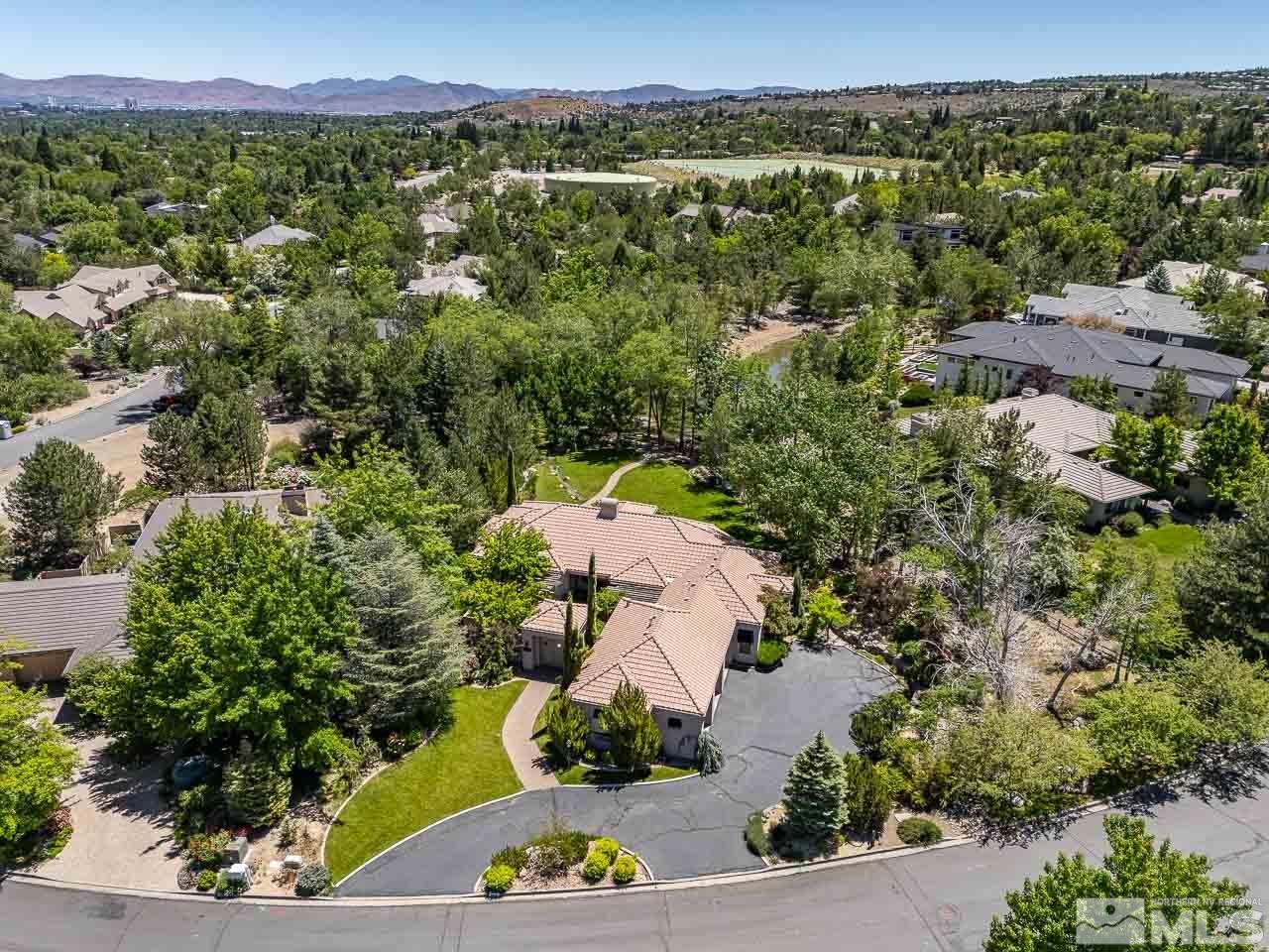 4440 Juniper Trail Reno, NV 89519 - Photo 5 of 29 an aerial view of a house with a yard