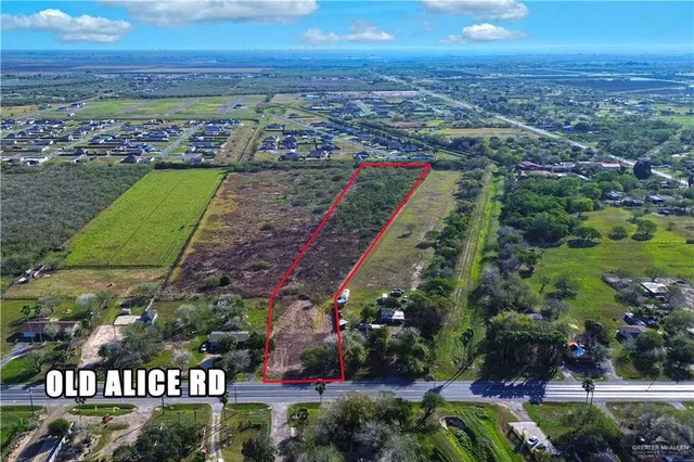 a view of a city with an ocean view