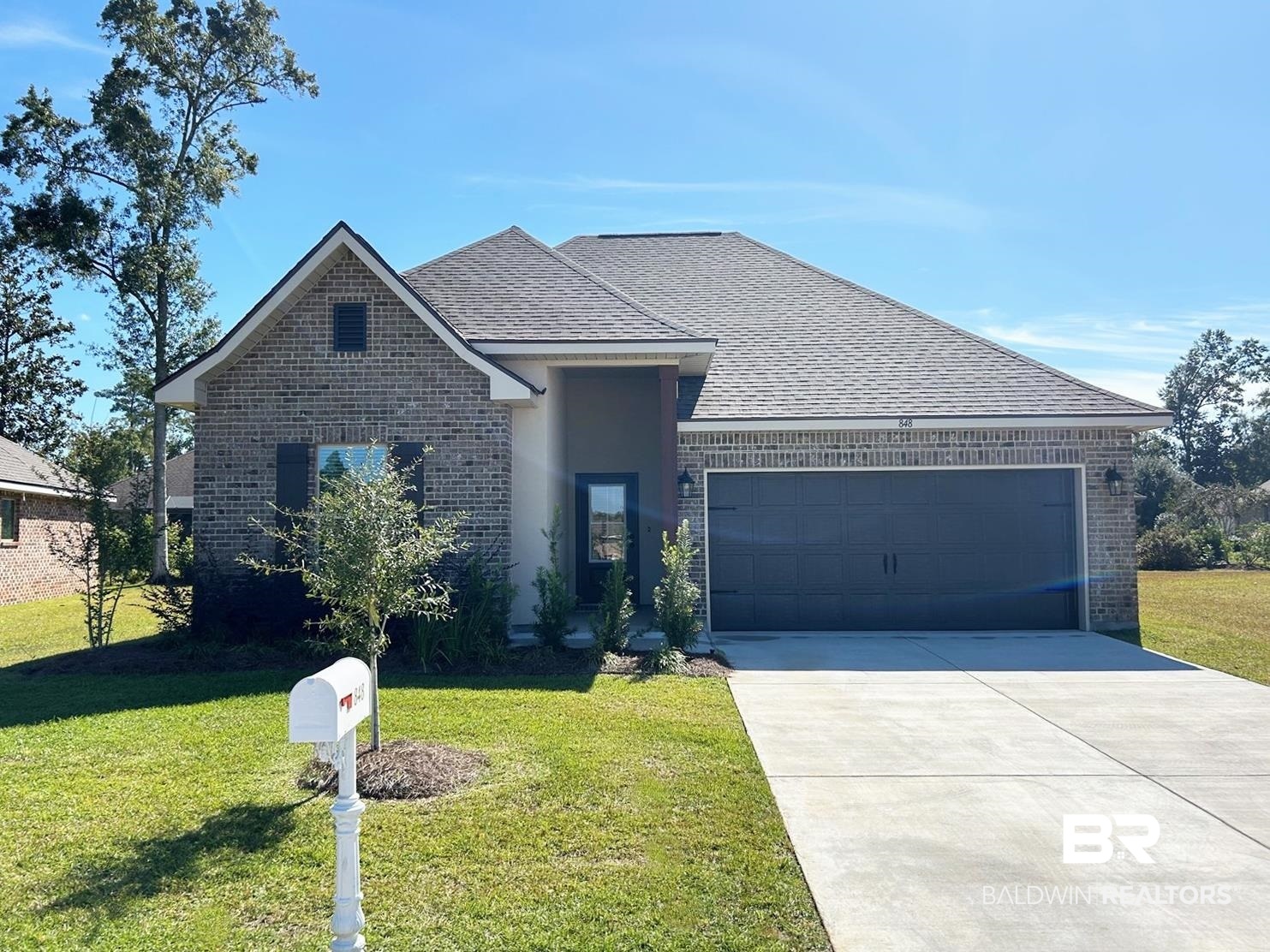 848 Sumter Loop Foley, AL 36535 - Photo 1 of 16 View of front of property featuring a front yard and a garage