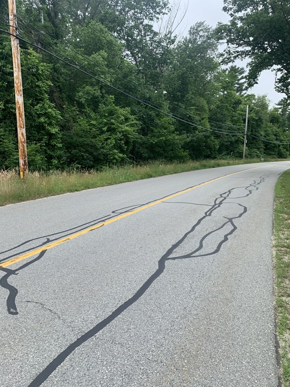 0 Clapp Road Rochester, MA 02770 - Photo 3 of 3 a view of a road with a yard
