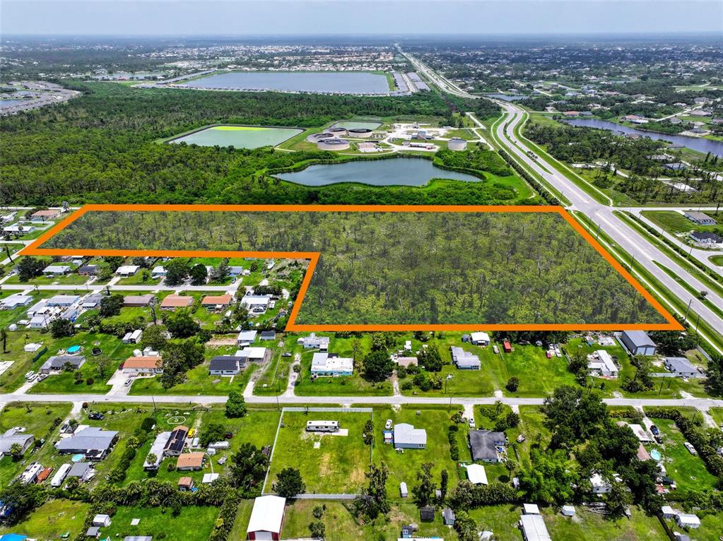 8399 Cypress Road Englewood, FL 34224 - Photo 4 of 4 a view of a city