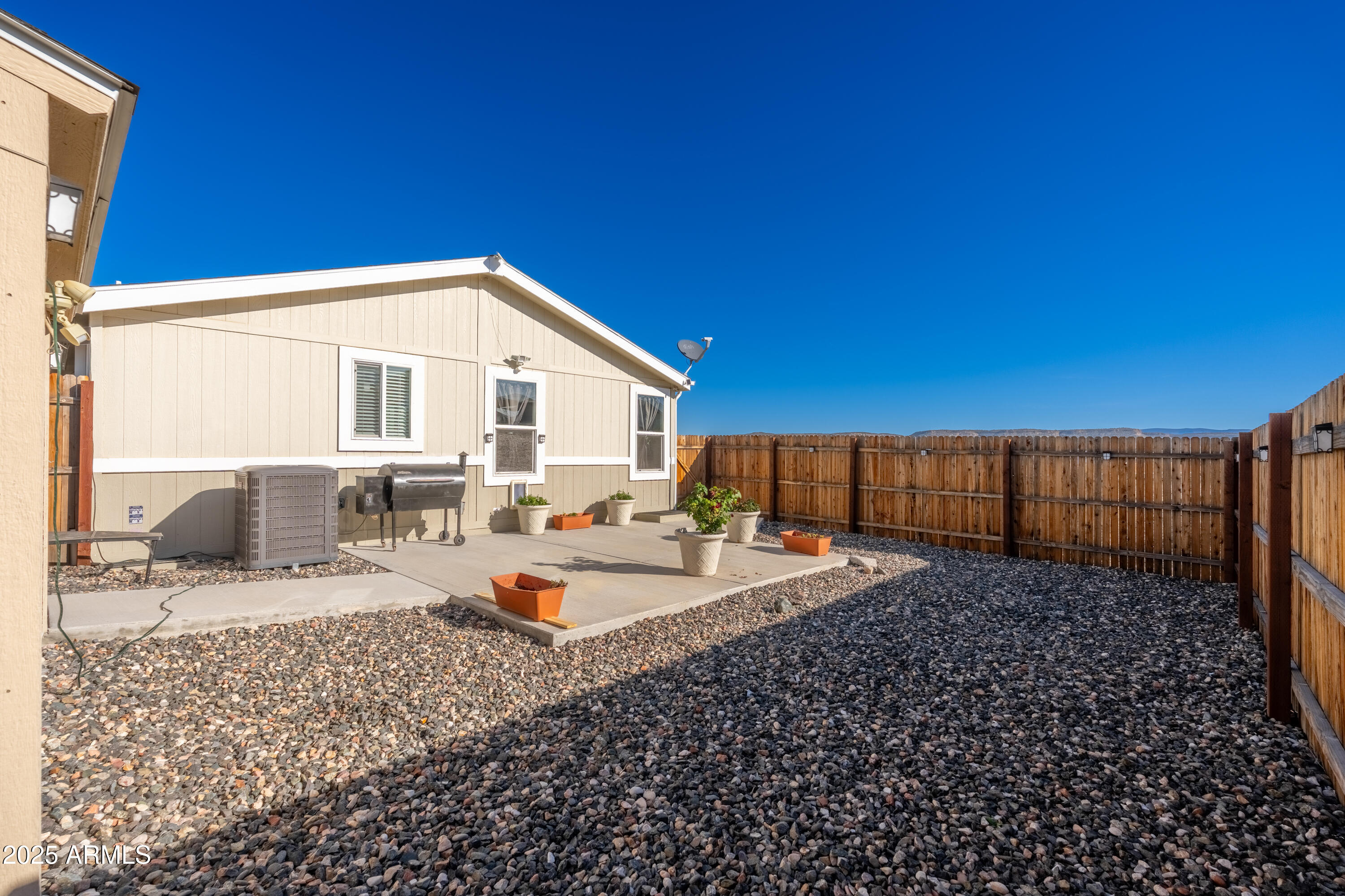1033 Wheeler Road Camp Verde, AZ 86322 - Photo 29 of 51 a view of a house with backyard and sitting area