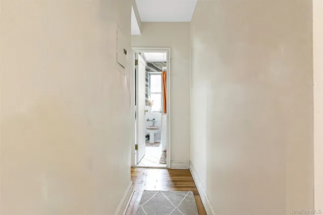 a bed room with a bed and a window