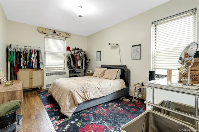 a bedroom with a bed and a closet