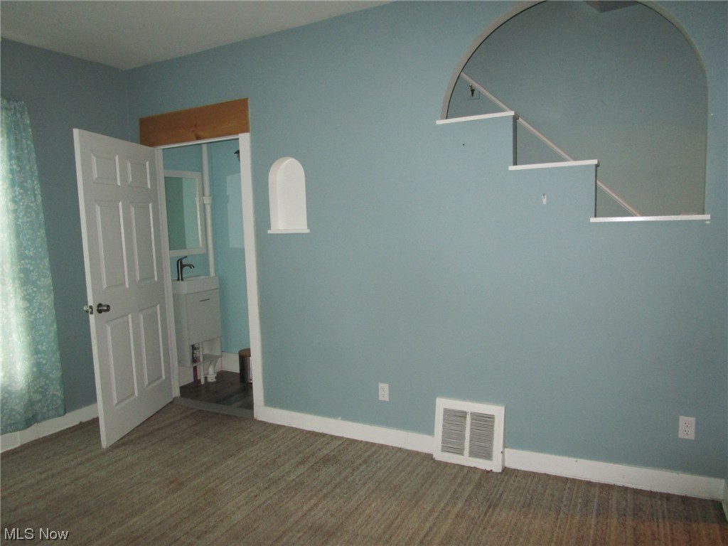 1938 East Prospect Road Ashtabula, OH 44004 - Photo 10 of 49 Family Room with attached half bath