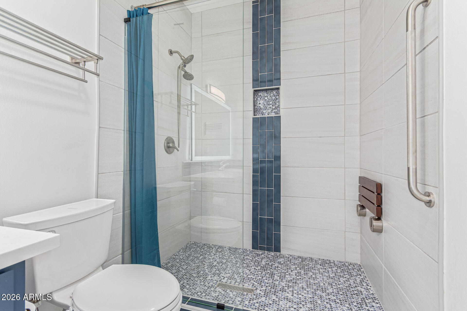 21613 South 154th Street Gilbert, AZ 85298 - Photo 36 of 57 a bathroom with a granite countertop toilet a sink and shower
