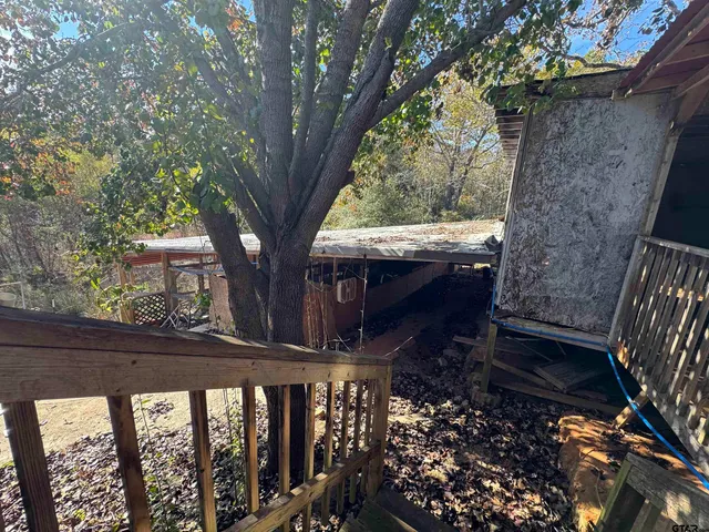 a view of backyard with green space