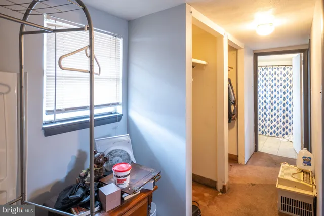 a view of an entryway with wooden floor