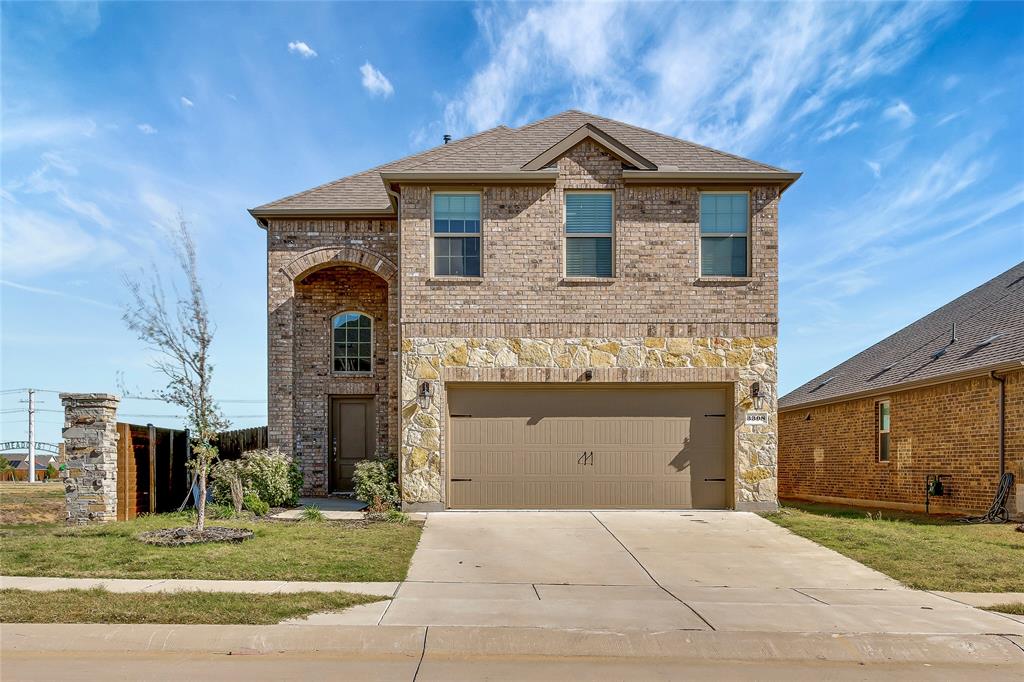 3308 Blacksmith Road Aubrey, TX 76227 - Photo 1 of 29 a front view of a house with a yard