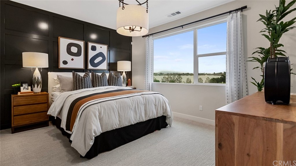 264 Siena Lake Forest, CA 92630 - Photo 11 of 27 a bed sitting in a bedroom next to a window