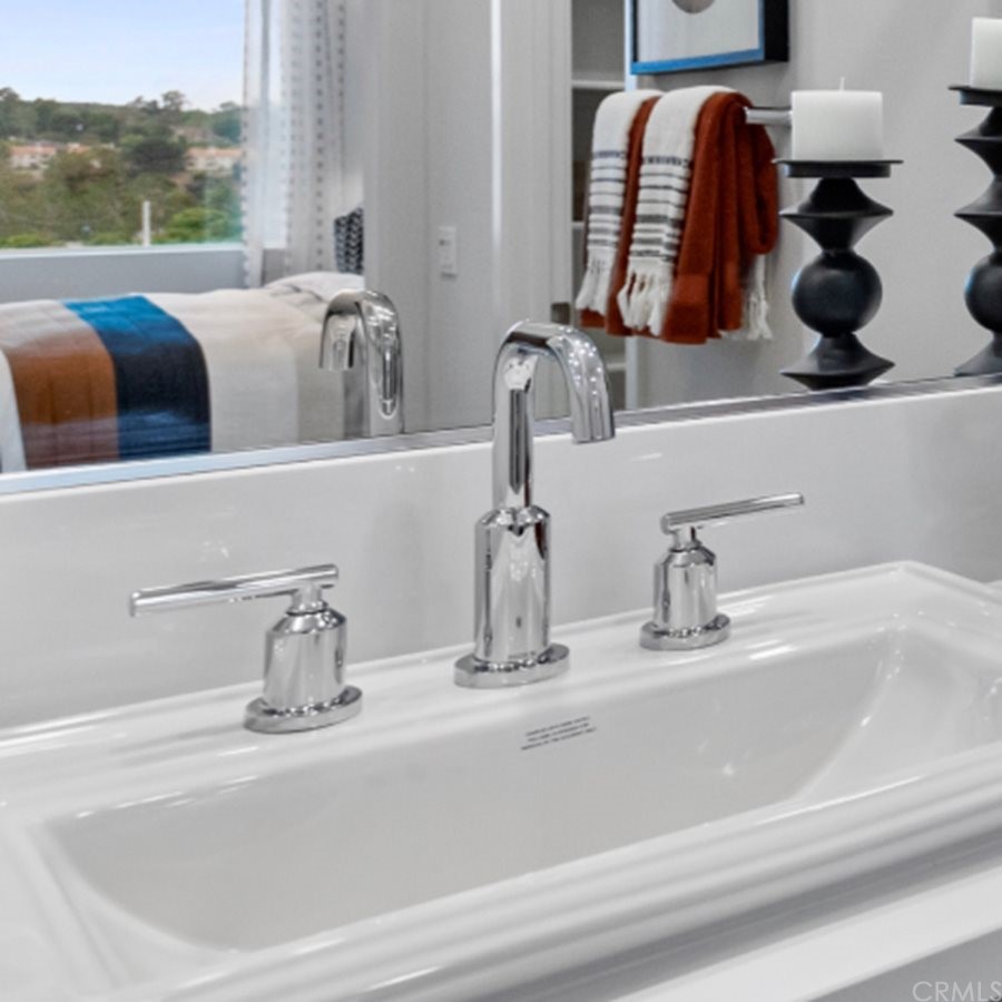 264 Siena Lake Forest, CA 92630 - Photo 13 of 27 a bathroom sink with a mirror