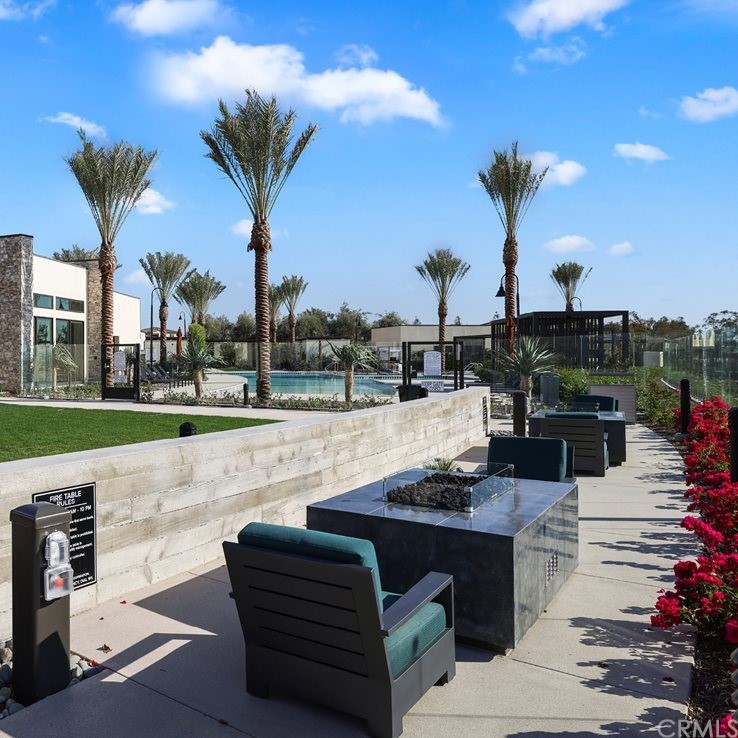 264 Siena Lake Forest, CA 92630 - Photo 19 of 27 a view of a terrace with a table and chairs
