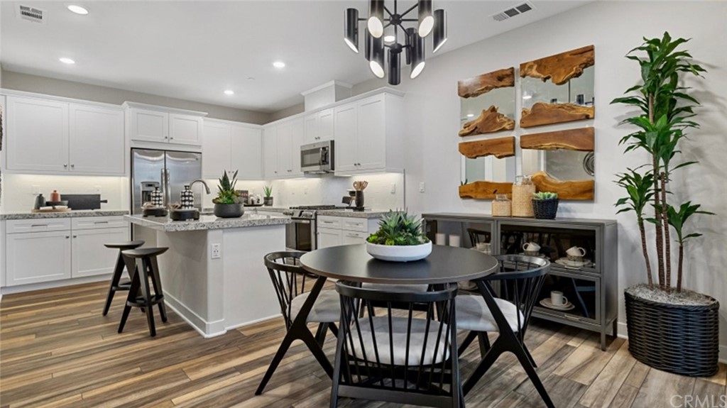 264 Siena Lake Forest, CA 92630 - Photo 10 of 27 a dining room with furniture and window